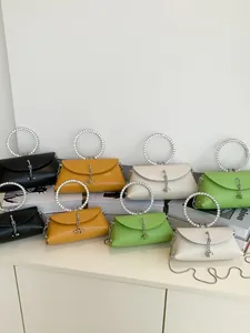 Minimalist jelly shoulder bag with diamond-encrusted ring handle and metal chain strap