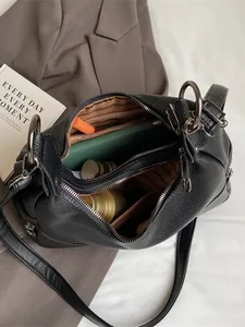Large black lychee pattern leather hobo bag with dual zipper and spacious interior
