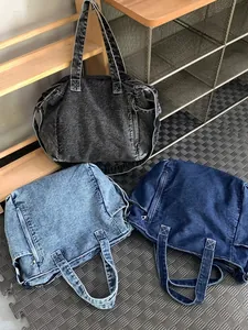 Large capacity denim messenger bag for men and women in dark blue, light blue, and grey