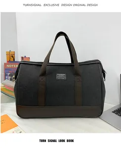 Close-up of black canvas travel bag with leather stitching and Fashion Instinct logo