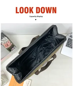 Capacity display of large olive canvas travel bag with waterproof lining and brown handles