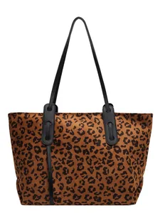 Large leopard print tote bag with black leather handles for women on white background