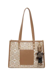 Chic beige and brown tote bag with all-over print and cute rabbit charm for daily work