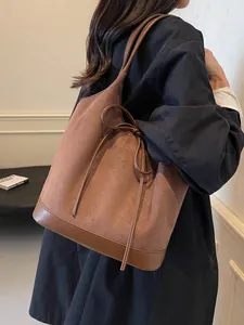 Brown frosted large-capacity tote bag with suede finish and bow drawstring detail