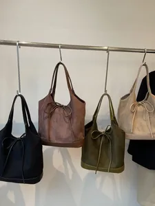 Minimalist frosted tote bags with bow details in black, coffee, green and beige colors