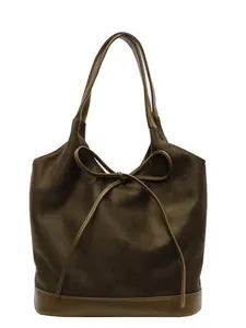 Olive green suede bow tote bag with contrast leather handles and minimalist design