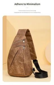 Gros plan sur le sac bandoulière vintage en similicuir marron avec double fermeture