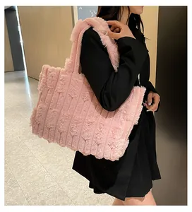Detail of pink faux fur tote bag showing soft ribbed texture and plush material