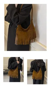 Detail van bruine suède hobo-tas met bohemien franjes en getextureerde afwerking van stof