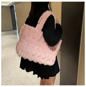 Detailed texture of pink faux fur tote bag with vertical stripes for winter outfits