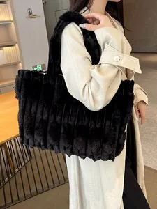 Large black plush tote bag with striped faux fur texture for women autumn winter style