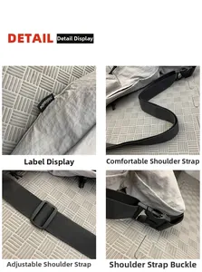 Detail of grey nylon crossbody bag showing waffle texture, brand label, and strap buckle