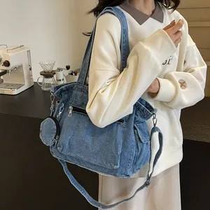 Large capacity blue denim tote bag with crossbody strap and small round coin purse