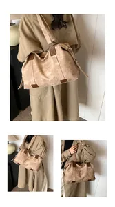 Détail du sac cabas vintage en toile kaki avec finitions en cuir brun et texture souple