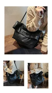 Vue détaillée du sac bandoulière noir texturé avec large sangle et rabat élégant