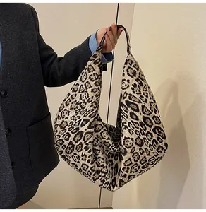 Close-up of leopard print canvas tote bag with high-quality texture and retro design
