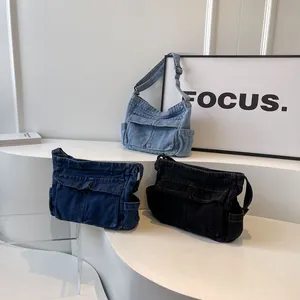 Retro denim shoulder bags in blue and black colors featuring multi-pocket cargo design