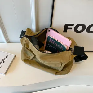 Mustard yellow canvas messenger bag with large capacity for laptop and books