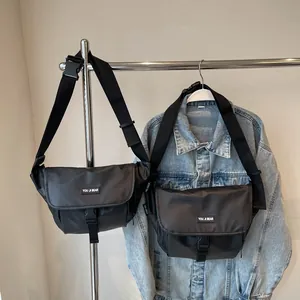 Waterproof matte black crossbody bag with flap cover and adjustable buckle for commuting