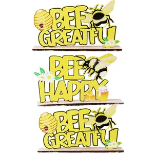 Three-piece bee-themed wooden table decor with Bee Happy and Bee Greatful text