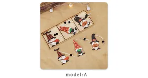 Detailed view of Halloween wooden gnome ornaments with beads in a wooden storage box