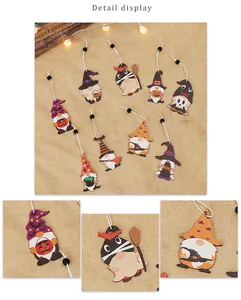 Detail display of wooden Halloween gnomes featuring pumpkin and wizard hat elements
