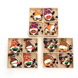 Halloween painted wooden gnome hanging ornaments set in boxes with pumpkin and bat patterns