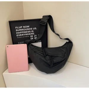 Large capacity black crescent canvas crossbody bag with adjustable wide strap and front zip