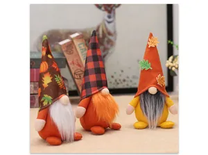 Detailed set of three Thanksgiving harvest gnomes with autumn maple leaf patterns