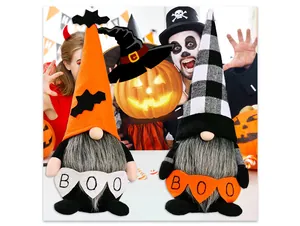 Detail of Halloween gnomes with BOO flags and orange bat hats in a festive party setting