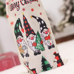 Linen Christmas wine bottle covers with gnome prints and Merry Christmas greeting