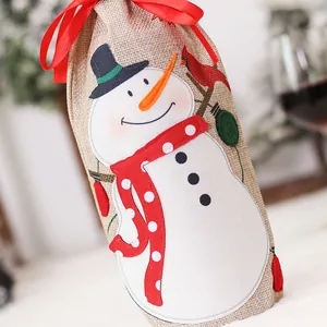 Linen Christmas wine bottle bag with embroidered snowman and red ribbon drawstring