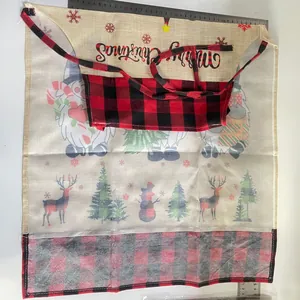 Detailed view of Christmas gnome apron with red plaid patterns and size measurements