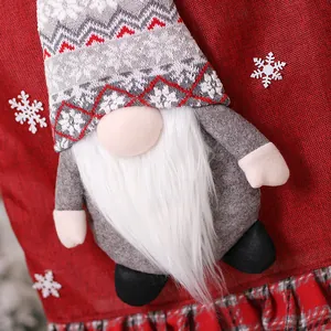 Christmas gnome chair cover with gray knitted hat and red snowflake patterns
