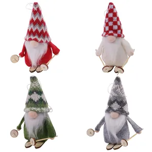 Set of four knitted Christmas ski gnomes in red, white, green and grey with wooden skis