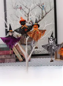 Detailed view of Halloween ghost hanging ornaments on branches for festive party decor