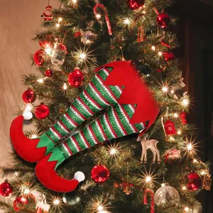 Christmas elf leg tree decoration with red and green stripes and pointed boots