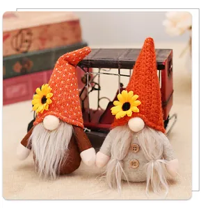 Detail of sunflower gnome plush with knitted hats and faux fur beards for autumn decor
