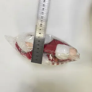 Dettaglio del fermatenda Babbo Natale da 15 cm con scala di misurazione