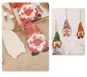 Detail of wooden fall gnomes hanging decor with turkey and pumpkin motifs for Thanksgiving