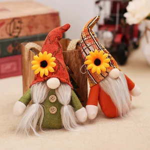 Harvest festival gnomes with sunflowers and autumn decor for home Thanksgiving display