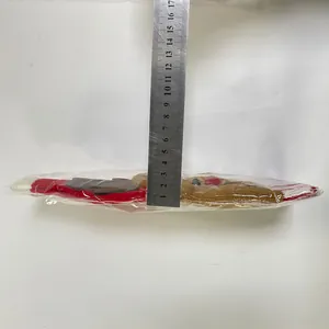 Measurement of knitted Christmas wine bottle cover in clear plastic packaging