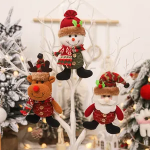 Plush Christmas ornaments set featuring Santa, Reindeer and Snowman on tree branches