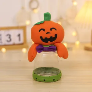 Halloween pumpkin plush toy candy jar with orange lid and transparent container