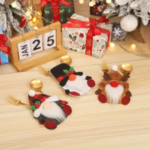 Three-piece Christmas gnome cutlery holder set with red plaid and reindeer antler designs