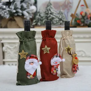 Three-piece burlap Christmas wine bottle gift bags with Santa, Snowman and Reindeer motifs