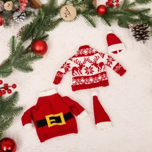 Christmas knitted wine bottle covers with reindeer and Santa belt designs for table decor