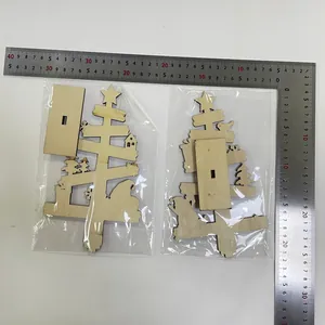 Décorations de Noël en bois découpées au laser avec règle montrant la taille de 25-27cm