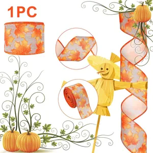 Detail of autumn maple leaf pattern on faux linen ribbon for Thanksgiving gift wrapping