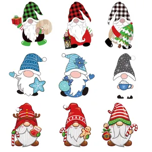 Set of 9 wooden Christmas gnome ornaments featuring Nordic patterns and holiday elements